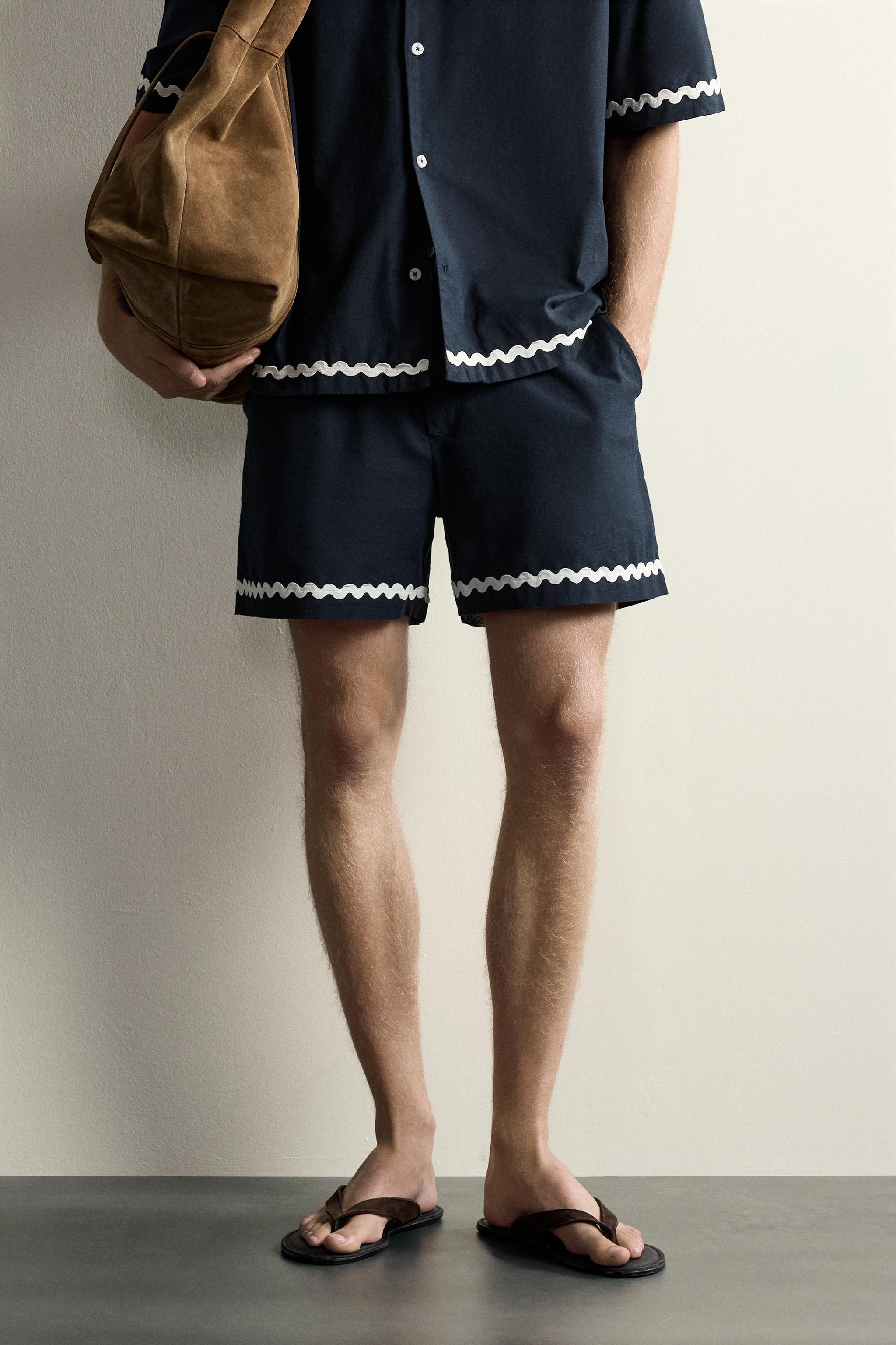SHORT COURT BRODERIE POISSON